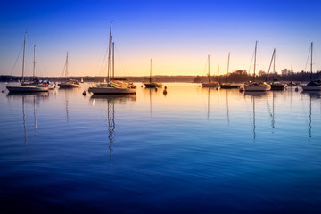Fototapeta na wymiar Arona, italy, lake. sunset at the port.