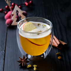 Mulled cider with cinnamon, cloves, anise and citrus