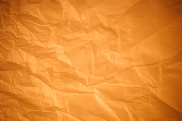 Brown crumpled paper background.