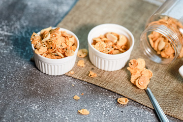 Cornflakes and grains in the white bowl the good breakfast in dairy for the fresh gourment and good healthy in everyday.