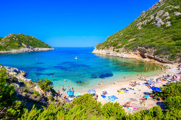 Fototapeta na wymiar Porto Timoni beach at Afionas is a paradise double beach with crystal clear azure water in Corfu, Twin bay, Ionian island, Greece, Europe