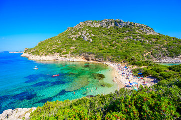 Fototapeta na wymiar Porto Timoni beach at Afionas is a paradise double beach with crystal clear azure water in Corfu, Twin bay, Ionian island, Greece, Europe