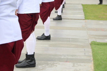 Row of mans wear red loincloth, Thailand.