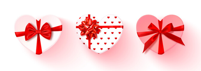 Set of heart-shaped gift boxes with red bow isolated on transparent background.Vector illustration