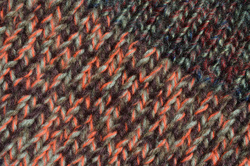 Handmade knitted fabric colored wool background texture