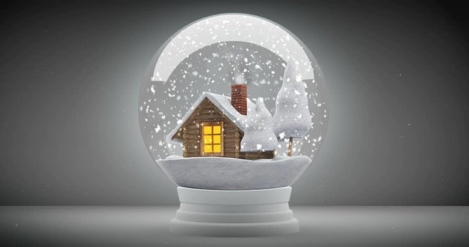 Christmas snow globe on wooden background. Can be used as a Christmas or a New Year gift or symbol