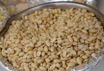 close up of peanuts in a bowl