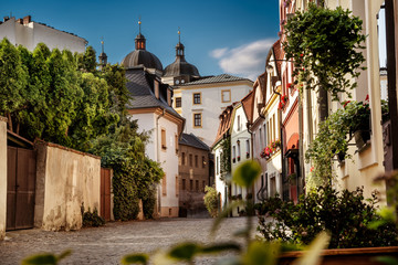 Olomouc, Hrncirska street - Romantic street in the old town with church of st. Michael. - obrazy, fototapety, plakaty
