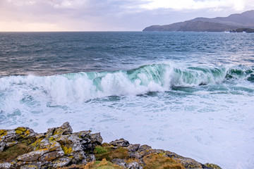 Huge waves breaking at Muckross Head - A small peninsula west of Killybegs, County Donegal, Ireland. The cliff rocks are famous for climbing