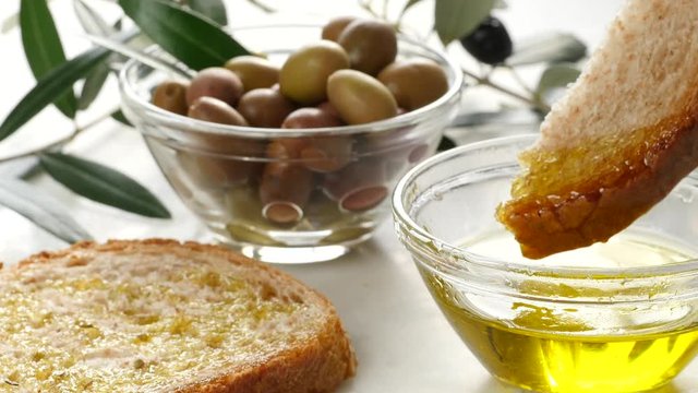 extra virgin oil, dipping bread in oil, genuine italian ingredient, healthy food, natural product