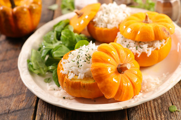 baked pumpkin with rice and salad