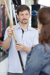 Fototapeta na wymiar man holding a cue stick