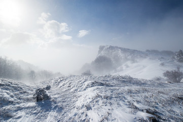 Fototapeta na wymiar Snowstorm in the mountains