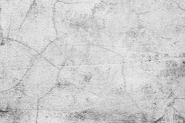 Obraz premium Texture of a concrete wall with cracks and scratches which can be used as a background