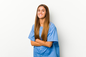 Young caucasian nurse woman laughing and having fun.