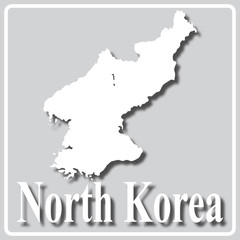 gray icon with white silhouette of a map North Korea