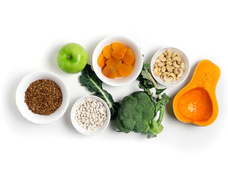 Food sources of potassium, magnesium on a white background top view. Copy Space.