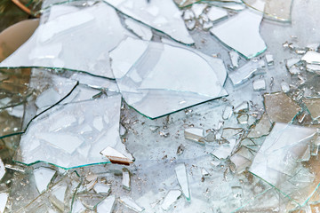 Recycling industry - Broken glass container. A closeup shot of a broken glass.