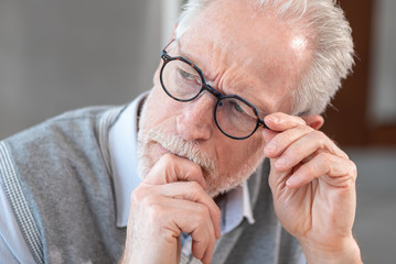 Pensive senior businessman