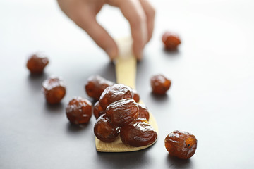 Healthy foods. Dried fruits for diet. Prunes, dates, raisins and figs. Healthy and proper nutrition for life.