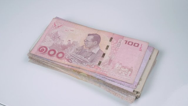 Currency stop motion animation of Thai banknotes view.