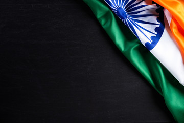 Indian republic day concept. Indian flag with the text Happy republic day against a blackboard...