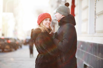 Young couple walking through the winter