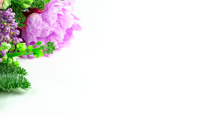 Very beautiful bouquet of flowers from peonies, and lilacs decorated with coniferous branches, winter-spring plants close-up. Holiday concept. Flowers for Mother's Day. Copy space.