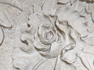 Low relief cement Thai style handcraft of rose flower