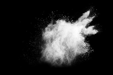 White powder explosion on black background.