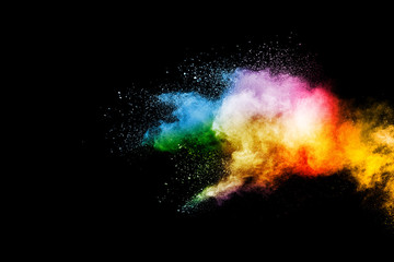 Obraz na płótnie Canvas Colorful powder explosion on black background.