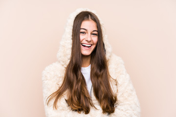 Young caucasian woman posing isolated laughing and having fun.