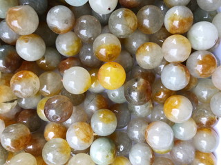 Close up small colorful beads background.