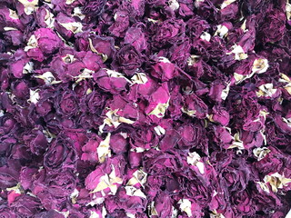 Dried small rosebuds for herbal tea. Pink colored dry roses.