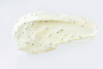 A sample of a cosmetic scrub close-up. The concept of organic natural cosmetics, face and body care. Copyspace, minimalism, macro.