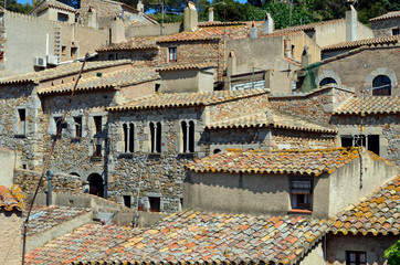 Obraz premium Urban environment historical buildings and castle in Spain europe Catalunya.
