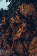 Beauty woman posing in the beach, outdoor fashion portrait, bikini, skin tan, tattoo, dreadlocks, cute, Thailand,