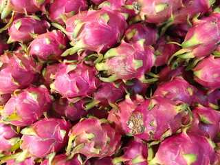 Dragon fruit on market stand, Thailand.
