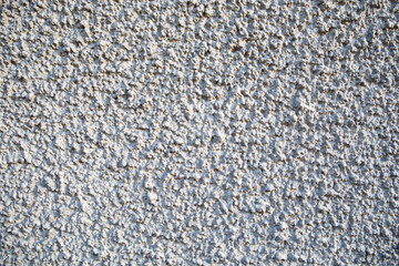 Textured background. Decorative plaster walls, external decoration of facade