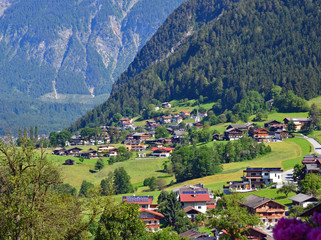 Obraz premium Austria europe mountain landscape with village and natural scene grass lands.