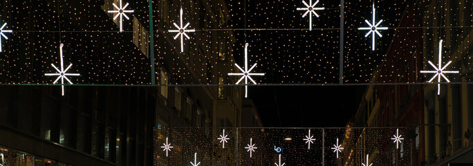 hight city street and sky with christmas lights