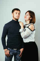 Portrait of a Young couple in love on a light background