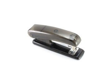  Office stapler made of translucent black plastic.