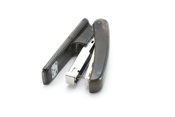  Office stapler made of translucent black plastic.
