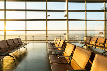 Chairs in modern airport terminal