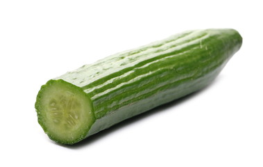 Fresh sliced cucumber half isolated on white background