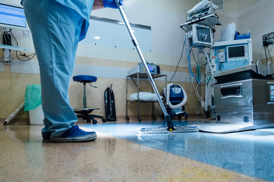 Concept Photo Of A Hospital Worker Doing Cleaning In Operation Room