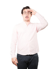 Fototapeta premium Astonished young man with a gesture of looking away