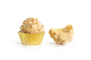 Homemade white chocolate almond balls on white background