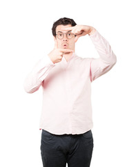 Fototapeta premium Amazed young man making a gesture of taking a photo with the hands